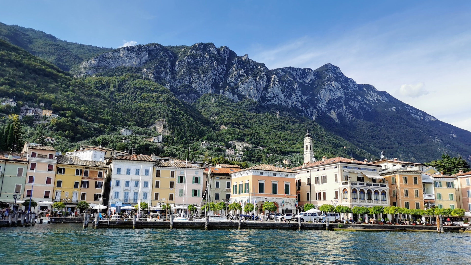 Scenic view of a picturesque lakeside town on Lake Garda, northern Italy, symbolizing GaussML's expansion into the Italian market.